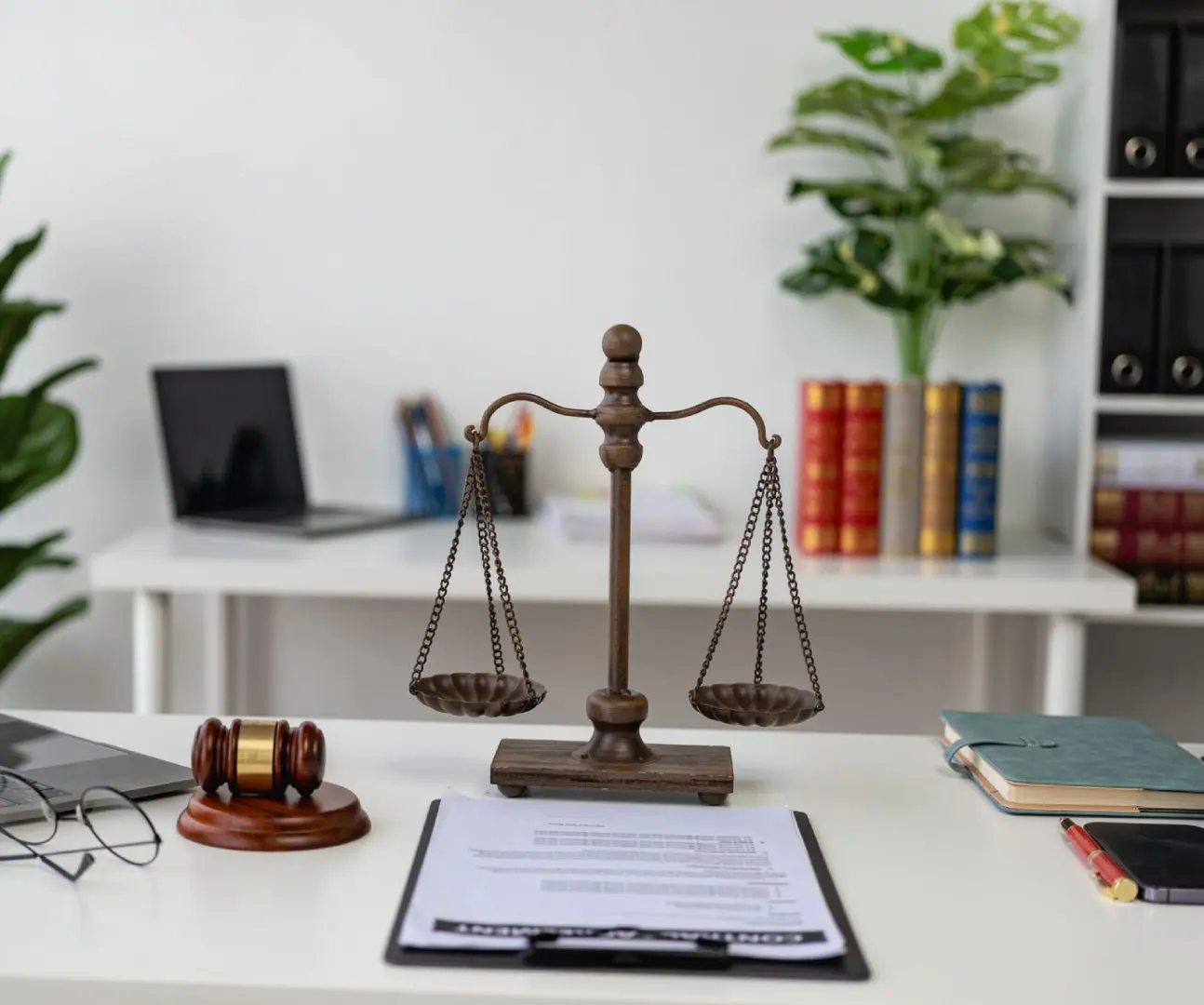 Scales of justice on office desk